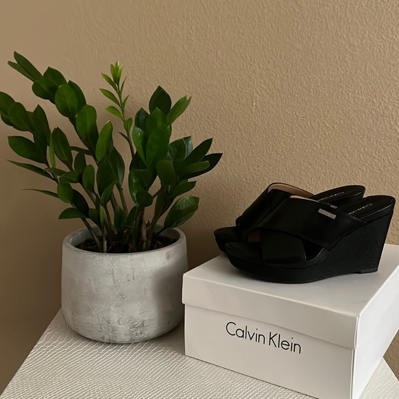 Calvin Klein Shoes - Calvin Klein black wedge, brand new.